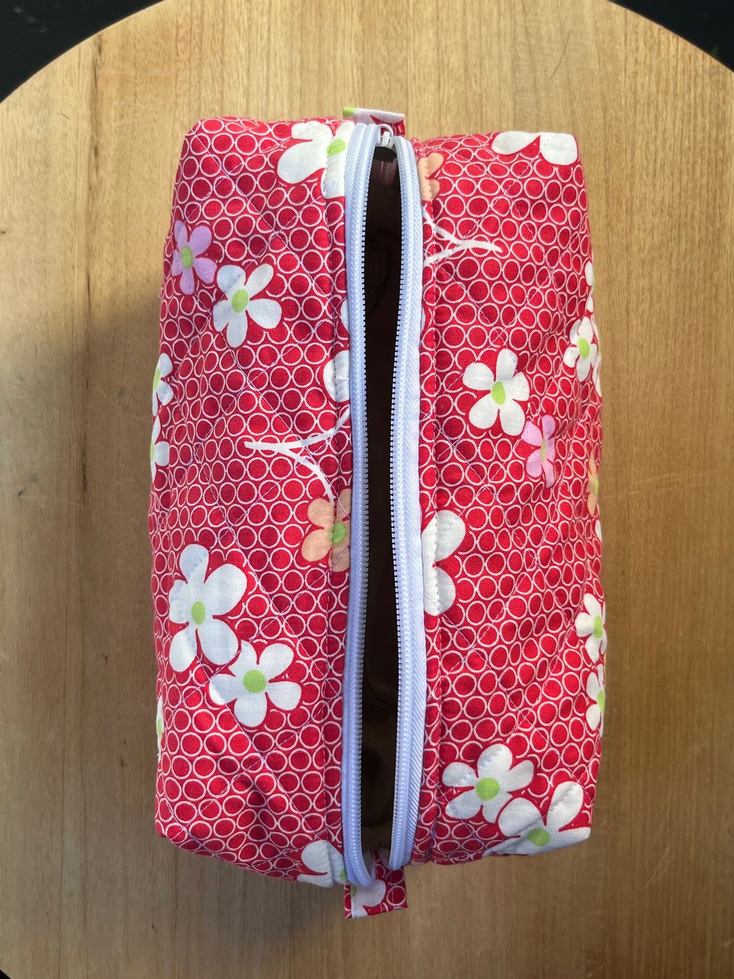 Groovy flowers on red Chubby Makeup pouch